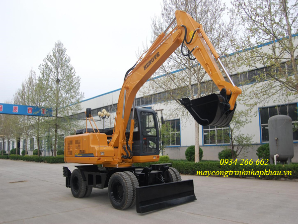 máy xúc đào bánh lốp HENGTE gầu 0.55m3