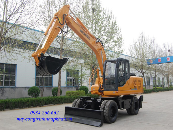 máy xúc đào bánh lốp HENGTE gầu 0.55m3